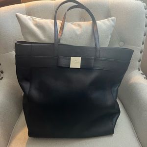 Kate Spade Purse. Measures 14” x 16”. Well cared for. Includes dust bag.